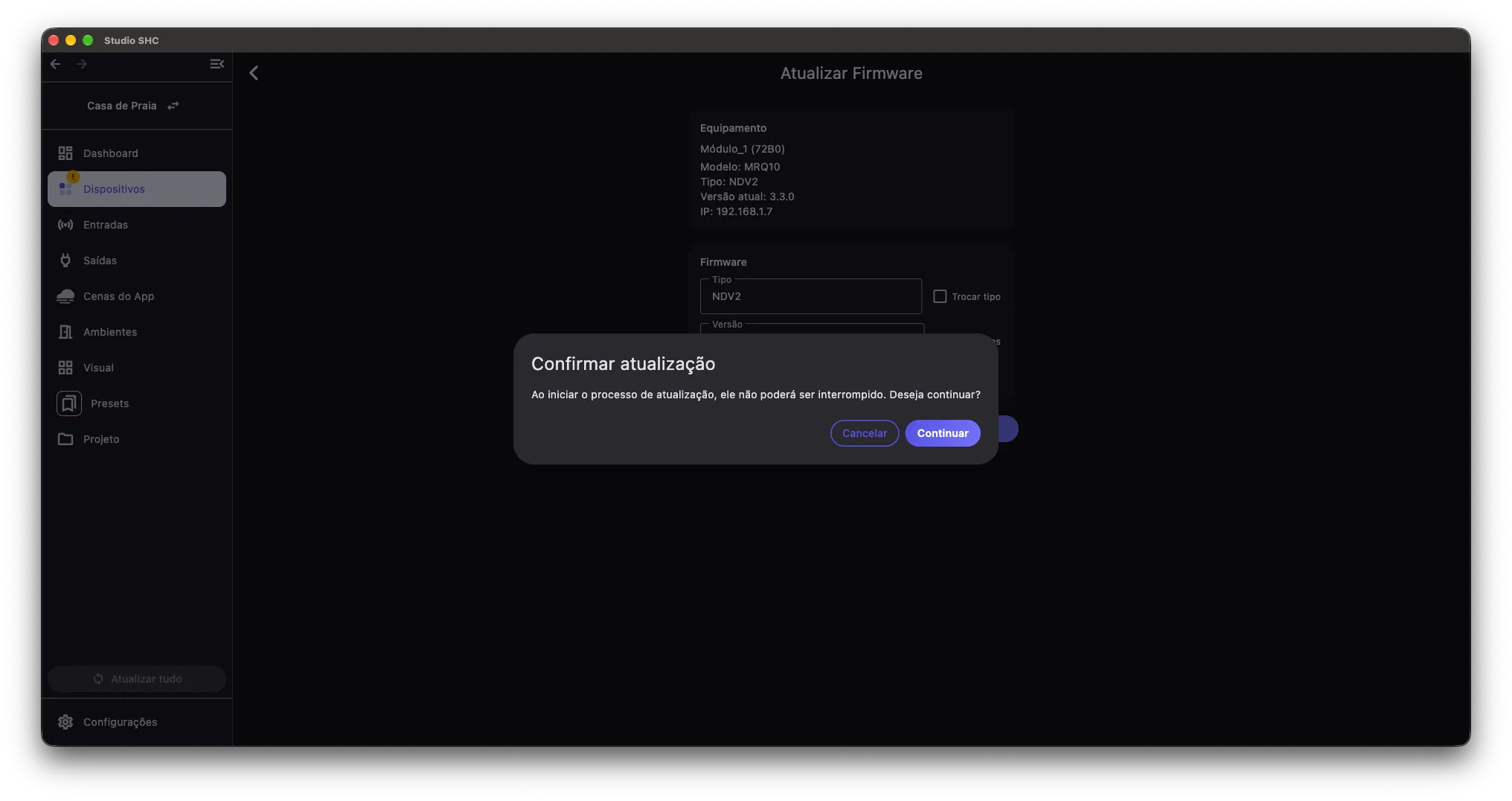 Janela Confirmar atualização sobre a tela Atualizar Firmware, avisando que o processo não poderá ser interrompido, com os botões Cancelar e Continuar